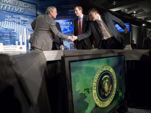 President George W. Bush greets state participants at the end of a Panel on the American Competitiveness Initiative at Cisco Systems, Inc in San Jose, California, Friday, April 21, 2006. White House photo by Eric Draper