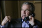 President George W. Bush speaks with Iraqi Parliament Speaker Mahmoud al-Mashhadani during a telephone call in Rancho Mirage, California, Sunday, April 23, 2006. White House photo by Eric Draper