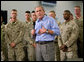 President George W. Bush speaks with Iraqi Parliament Speaker Mahmoud al-Mashhadani during a telephone call in Rancho Mirage, California, Sunday, April 23, 2006. White House photo by Eric Draper