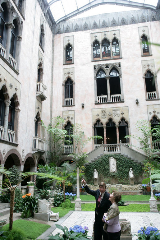 Stan Kozak, Chief Horticulturist of the Gardner Museum, guides Mrs. Laura Bush though a tour of the interior courtyard garden, Tuesday, April 24, 2006, during a visit to the Isabella Stewart Gardner Museum in Boston. The museum is modeled after a 15th century Venetian Palazzo, turned inside out and surrounding the courtyard. White House photo by Shealah Craighead