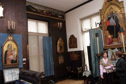 Mrs. Laura Bush talks with Peggy Burchenal, Curator of Education and Director of the US Department of Education research grant, Tuesday, April 24, 2006, while stopping in the Dutch Room during a tour of the Isabella Stewart Gardner Museum in Boston. The museum's art collection is comprised of more than 2,500 objects, throughout three floors, and has remained essentially unchanged since Isabella Stewart Gardner's death in 1924. White House photo by Shealah Craighead