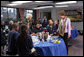 On a visit to Charlestown Navy Yard in Boston, Mass., during National Park Week, Mrs. Laura Bush and students from Warren-Prescott School, participate in an electronic field trip to Carlsbad Caverns National Park, N.M., Tuesday, April 24, 2006. Electronic field trips allow students to virtually visit, via the internet, US National Parks and are made possible through partnerships between Ball State University and museums across the country. White House photo by Shealah Craighead