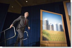 President George W. Bush acknowledges the applause Tuesday, April 25, 2006, as he arrives on stage at the Marriott Wardman Park Hotel in Washington, D.C., where he made remarks on energy to the Renewable Fuels Association.  White House photo by Paul Morse