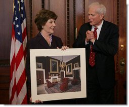 Mrs. Laura Bush is presented with a print by Dr. James Billington, the Librarian of Congress, showing an interior view of the White House as it looked in the early 1900s, Wednesday, April 26, 2006 during the James Madison Council Luncheon at the Library of Congress. White House photo by Kimberlee Hewitt