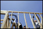 President George W. Bush hammers nails with New Orleans Mayor Ray Nagin on a home constructed by volunteers in the Upper 9th Ward of New Orleans, Louisiana, Thursday, April 27, 2006. White House photo by Eric Draper