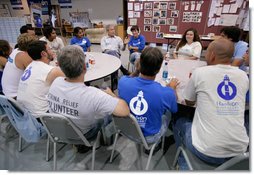 President George W. Bush meets with volunteers from Hands On Network at their base camp in Biloxi, Mississippi, Thursday, April 27, 2006.  White House photo by Eric Draper