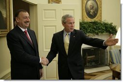 President George W. Bush welcomes President Ilham Aliyev of Azerbaijan to the Oval Office Friday, April 28, 2006. White House photo by Paul Morse