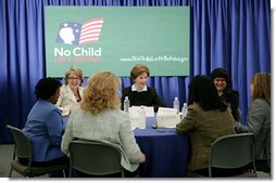 Mrs. Laura Bush is joined by U.S. Department of Education Secretary Margaret Spellings at a roundtable discussion with Ohio teachers during “Celebrating Teachers” week, Tuesday, May 2, 2006 at the Thurber Center in Columbus, Ohio, highlighting the importance of teachers in children's lives. Moderator of the discussion is Deepa Ganschinietz, far right, the 2006 Ohio Teacher of the Year. White House photo by Kimberlee Hewitt