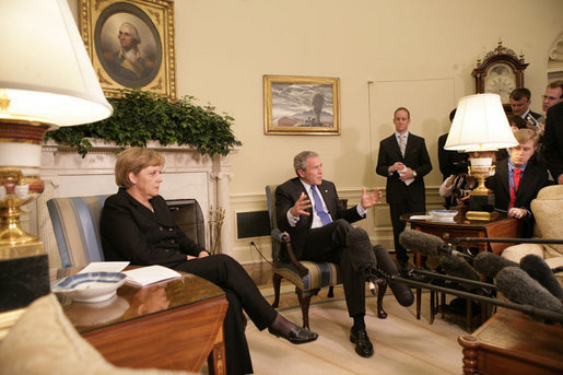 President George W. Bush speaks to members of the media during his meeting with German Chancellor Angela Merkel in the Oval Office at the White House, Wednesday, May 3, 2006. White House photo by Eric Draper