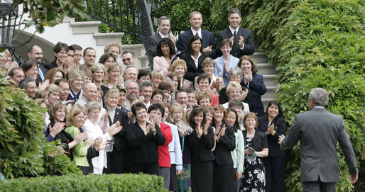 President George W. Bush is greeted by applause as he arrives on the South Lawn Wednesday, May 3, 2006, by recipients of the 2005 Presidential Awards for Excellence in Mathematics and Science Teaching. White House photo by Eric Draper