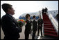 Officials from the United States and Lithuania line up on the tarmac to greet Vice President Dick Cheney and his wife Lynne Cheney upon their arrival Wednesday, May 3, 2006 to Vilnius, Lithuania. The Vice President's visit to Vilnius is the first stop in a three-nation, six-day trip that includes bilateral meetings with leaders of the Baltic and Black Sea regions at the Vilnius Conference 2006. White House photo by David Bohrer