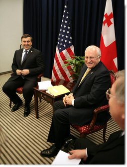 Vice President Dick Cheney and President Mikheil Saakashvili of Georgia, share a light moment with U.S. Ambassador John Tefft, right, during a bilateral meeting held during the Vilnius Conference 2006 in Vilnius, Lithuania, Thursday, May 4, 2006. White House photo by David Bohrer