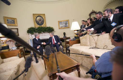 President George W. Bush visits with President Tabare Vazquez of Uruguay in the Oval Office Thursday, May 4, 2006. White House photo by Eric Draper