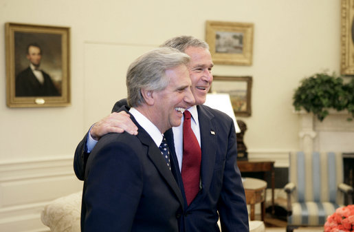 President George W. Bush and President Tabare Vazquez of Uruguay talk with the press in the Oval Office Thursday, May 4, 2006. White House photo by Eric Draper