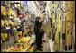 President George W. Bush looks over merchandise during a visit Frager's Hardware store in the Capitol Hill neighborhood of Washington, D.C., Friday, May 5, 2006. White House photo by Eric Draper