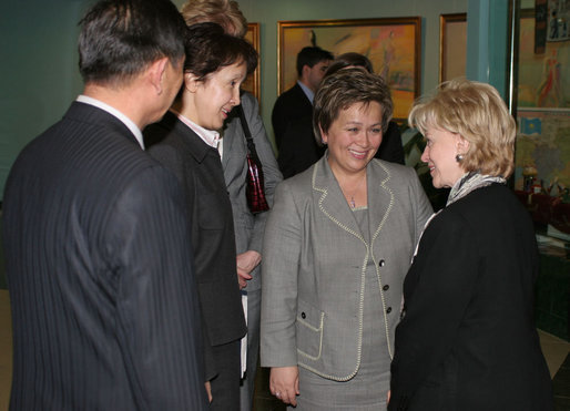 Mrs. Lynne Cheney listens to an interpreter, as she's greeted by Sabilya Mustafina, center, deputy Mayor of Astana, as she arrives at Biterek. Vice President Dick Cheney and Mrs. Cheney arrived in Kazakhstan Friday, May 5, 2006. Photo by Aleksandr Zhabchuk 