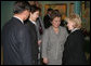 Mrs. Lynne Cheney listens to an interpreter, as she's greeted by Sabilya Mustafina, center, deputy Mayor of Astana, as she arrives at Biterek. Vice President Dick Cheney and Mrs. Cheney arrived in Kazakhstan Friday, May 5, 2006. Photo by Aleksandr Zhabchuk 