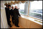 From a high window in the Presidential Palace, Kazakh President Nursultan Nazarbayev points out places of interest along the Astana, Kazakhstan skyline, Friday, May 5, 2006. White House photo by David Bohrer