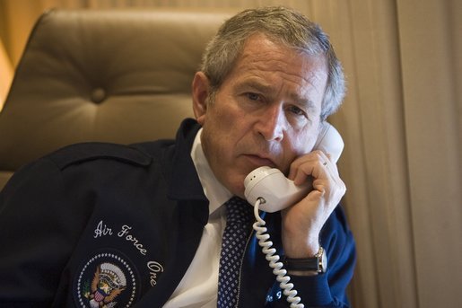 President George W. Bush speaks to Nigeria's President Olusegun Obasanjo from aboard Air Force One Saturday, May 6, 2006, regarding the recent progress towards peace in Darfur. White House photo by Paul Morse