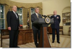 President George W. Bush announces his nomination of Gen. Michael V. Hayden as the next Director of the Central Intelligence Agency Monday, May 8, 2006, in the Oval Office as Ambassador John Negroponte, Director of National Intelligence, looks on. Said the President of Gen. Hayden: "He's the right man to lead the CIA at this critical moment in our nation's history." White House photo by Paul Morse