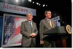 President George W. Bush is introduced by his brother Florida Governor Jeb Bush before delivering remarks on the Medicare Prescription Drug Benefit in Sun City Center, Florida, Tuesday, May 9, 2006. White House photo by Eric Draper