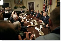 President George W. Bush talks with the press after discussing Iraq with former Secretaries of State and Defense in the Roosevelt Room Friday, May 12 ,2006. "Since we last met, a unity government is now in the process of becoming formed. I've got great hopes about this unity government," said the President. "We've got a Shia as the Prime Minister-designee, a Sunni as the Speaker, a Kurd as the President, all of whom have dedicated themselves to a country moving forward that meets the hopes and aspirations of the Iraqi people." White House photo by Eric Draper