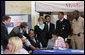 Mrs. Laura Bush meets with senior citizens during the last day of enrollment for the new Medicare prescription drug benefit at Shiloh Baptist Church in Washington, D.C., Monday, May 15, 2006. Talking with senior citizens with Mrs. Bush is Dr. Mark McClellan, Administrator, Centers of Medicare and Medicaid, and Secretary Mike Leavitt, Department of Health and Human Services. White House photo by Shealah Craighead