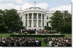 President George W. Bush speaks to an audience on the South Lawn Wednesday, May 17, 2006, during a signing of H.R. 4297, Tax Relief Extension Reconciliation Act of 2005. White House photo by Kimberlee Hewitt