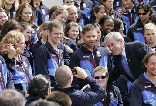 President George W. Bush poses for a photo after delivering congratulatory remarks to the 2006 U.S. Winter Olympic and Paralympic teams during a ceremony held on the South Lawn of the White House Wednesday, May 17, 2006. White House photo by Eric Draper