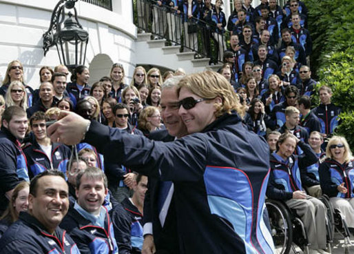 President George W. Bush poses for a photo after delivering congratulatory remarks to the 2006 U.S. Winter Olympic and Paralympic teams during a ceremony held on the South Lawn of the White House Wednesday, May 17, 2006. White House photo by Eric Draper