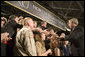 President George W. Bush greets audience members following his address on the American Competitiveness Initiative to an audience at Northern Kentucy University, Friday, May 19, 2006 in Highland Heights, Ky. White House photo by Kimberlee Hewitt