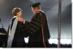 Dr. Roy Nirschel, President of Roger Williams University, thanks Mrs. Laura Bush for delivering the commencement speech at Roger Williams University on Saturday, May 20, 2006, in Bristol, Rhode Island. Mrs. Bush was awarded an honorary doctorate in education from Roger Williams University.  White House photo by Shealah Craighead