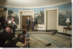 President George W. Bush, with Mrs. Laura Bush by his side, comments on the formation of the new govenment in Iraq, Sunday, May 21, 2006 in the Diplomatic Reception Room of The White House.  White House photo by Kimberlee Hewitt