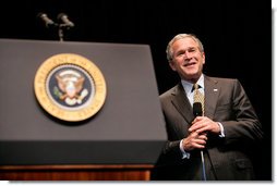 President George W. Bush reacts while taking questions from the audience Monday, May 22, 2006, following his remarks on the War on Terror to the National Restaurant Association gathering at Chicago's McCormick Place.  White House photo by Eric Draper