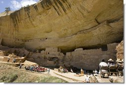 Mrs. Laura Bush talks to a crowd, Thursday, May 23, 2006, assembled in Long House cliff dwellings during a celebration of the 100th anniversary of Mesa Verde and the Antiquities Act in Mesa Verde, Colorado. Mesa Verde was the first national park established to protect America’s man-made treasures; and Long House is the second largest cliff dwelling in the park.  White House photo by Shealah Craighead