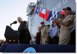 Vice President Dick Cheney gets a laugh from Navy commanders on stage as he makes a joke during an address to over 4,000 sailors and Marines from the flight deck of the amphibious assault ship USS Bonhomme Richard docked at Naval Station San Diego. White House photo by David Bohrer