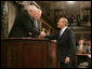 Vice President Dick Cheney congratulates Prime Minister Ehud Olmert of Israel, Wednesday, May 24, 2006, following the prime minister's remarks to a Joint Meeting of Congress at the U.S. Capitol. White House photo by David Bohrer