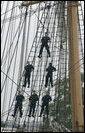 Crew members of the USCGC Eagle stand on the tall ship's rigging Thursday, May 25, 2006, near Fort Lesley J. McNair in Washington, D.C., during the Change of Command Ceremony for the Commandant of the United States Coast Guard. White House photo by Eric Draper