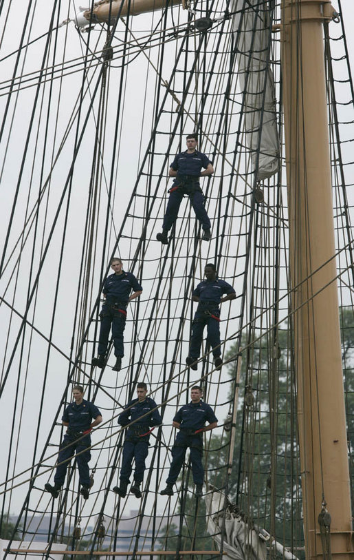 Crew members of the USCGC Eagle stand on the tall ship's rigging Thursday, May 25, 2006, near Fort Lesley J. McNair in Washington, D.C., during the Change of Command Ceremony for the Commandant of the United States Coast Guard. White House photo by Eric Draper