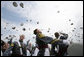 Graduates of the U.S. Military Academy take part in the traditional hat toss Saturday, May 27, 2006, after commencement ceremonies in West Point, N.Y. President George W. Bush delivered the commencement speech to the 861 Cadets. White House photo by Shealah Craighead