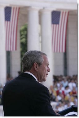 President George W. Bush delivers remarks during a Memorial Day ceremony held at the Arlington National Cemetery amphitheatre in Arlington, Va., Monday, May 29, 2006. White House photo by Paul Morse