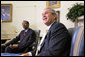 President George W. Bush and President Paul Kagame of Rwanda talk with the press during their meeting in the Oval Office Wednesday, May 31, 2006. White House photo by Paul Morse