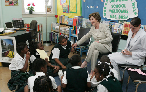 Mrs. Laura Bush talks with students during her visit to Our Lady of Perpetual Help School in Washington, Monday, June 5, 2006, where she announced a Laura Bush Foundation for America’s Libraries grant to the school. Mrs. Bush is joined by Our Lady of Perpetual Help fifth grade teacher Julie Sweetland, right. White House photo by Shealah Craighead