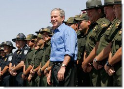 President George W. Bush joins U.S. Border Patrol agents on stage before delivering remarks on border security at the Federal Law Enforcement Training Center Artesia Facility in Artesia, New Mexico, Tuesday, June 6, 2006. White House photo by Eric Draper