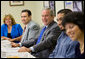 President George W. Bush visits with community leaders during a micro business networking breakfast at Catholic Charities – Juan Diego Center in Omaha, Nebraska, Wednesday, June 7, 2006. White House photo by Eric Draper