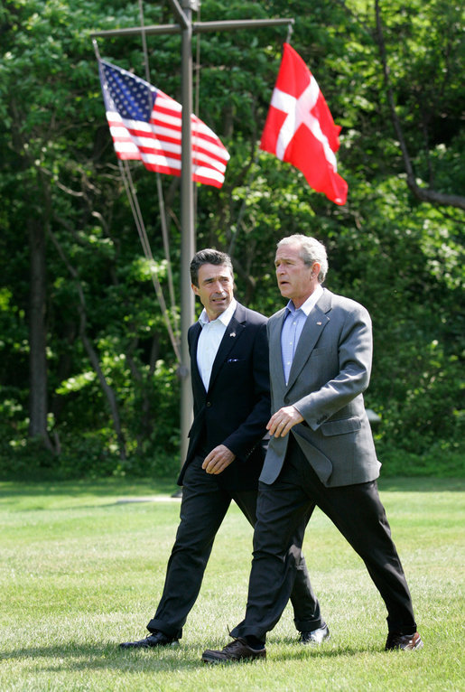 President George W. Bush walks with Prime Minister Anders Fogh Rasmussen of Denmark to their joint news conference at Camp David Friday, June 9, 2006. White House photo by Eric Draper