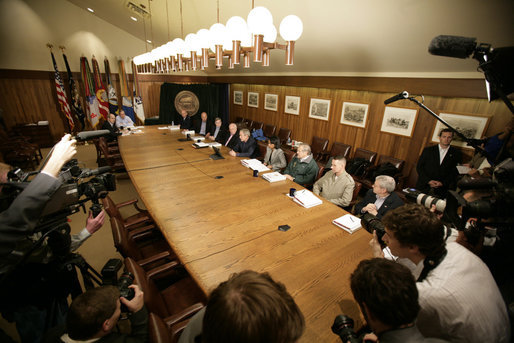 President George W. Bush is joined by his top advisors during an interagency team meeting on Iraq Monday, June 12, 2006 at Camp David, Md., part of a two-day conference on Iraq. White House photo by Eric Draper