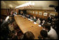 President George W. Bush is joined by his top advisors during an interagency team meeting on Iraq Monday, June 12, 2006 at Camp David, Md., part of a two-day conference on Iraq. White House photo by Eric Draper