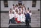 President George W. Bush stands with members of the World Cup Soccer Youth Delegation on the North Portico steps of the White House Monday, June 12, 2006. The delegation is comprised of 30 soccer players representing 13 countries. White House photo by Paul Morse