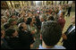 President greets U.S. troops and U.S. embassy personnel during his trip to Baghdad, Iraq, Tuesday, June 13, 2006. "This is a moment -- this is a time where the world can turn one way or the other, where the world can be a better place or a more dangerous place," said the President. "And the United States of America and citizens such as yourself are dedicated to making sure that the world we leave behind is a better place for all." White House photo by Eric Draper